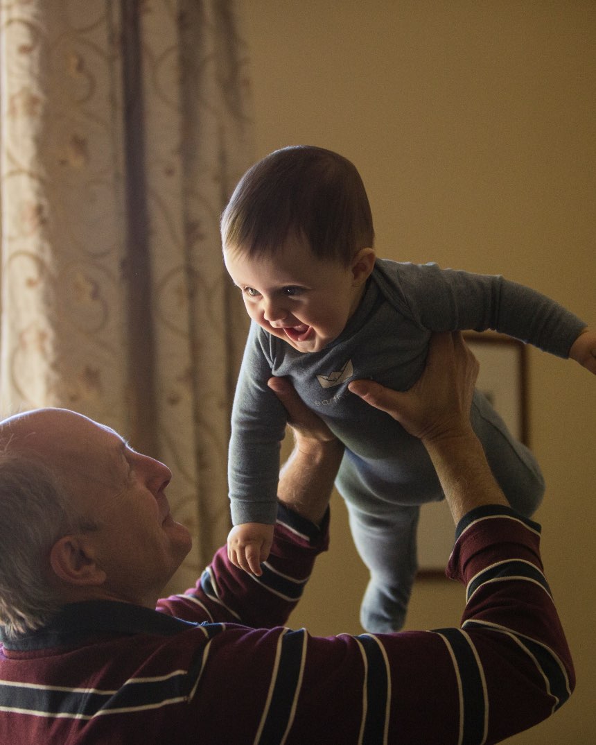 Man holding baby