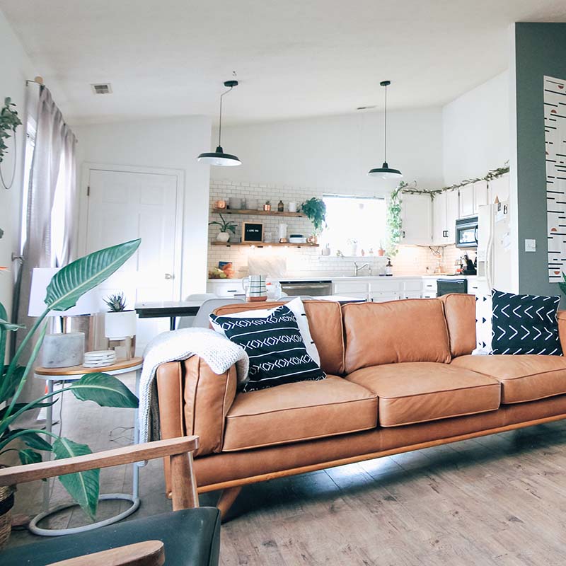 Your dream home with stylish kitchen, wooden floors and leather sofa