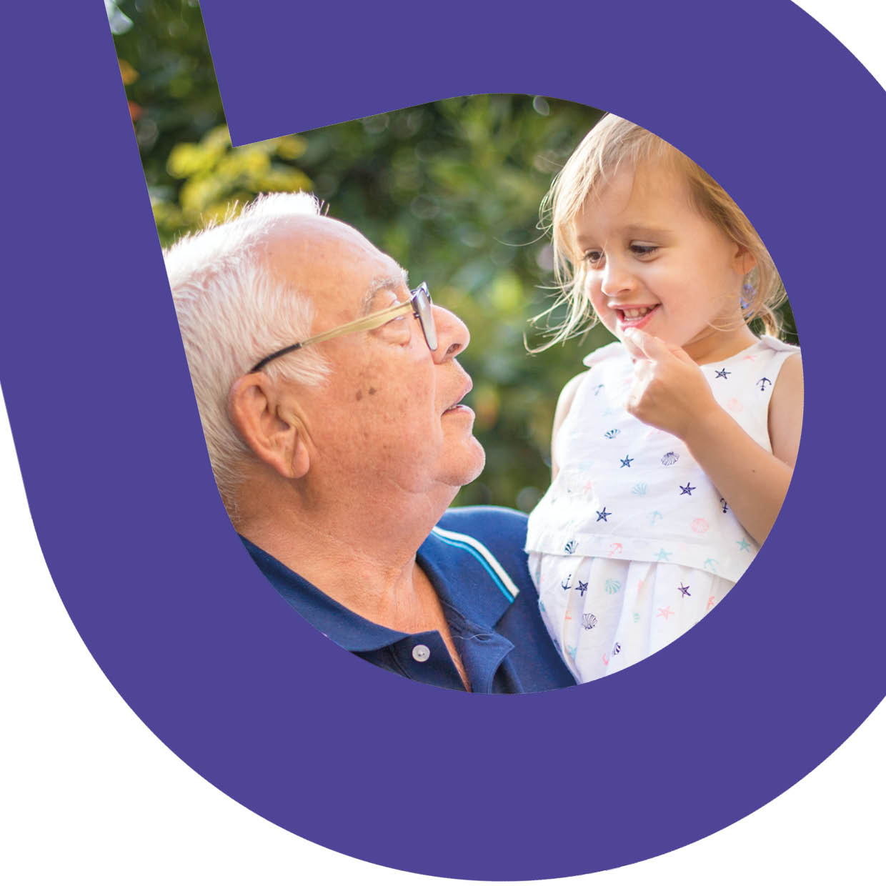 A grandad holding his daughter up and chatting to her