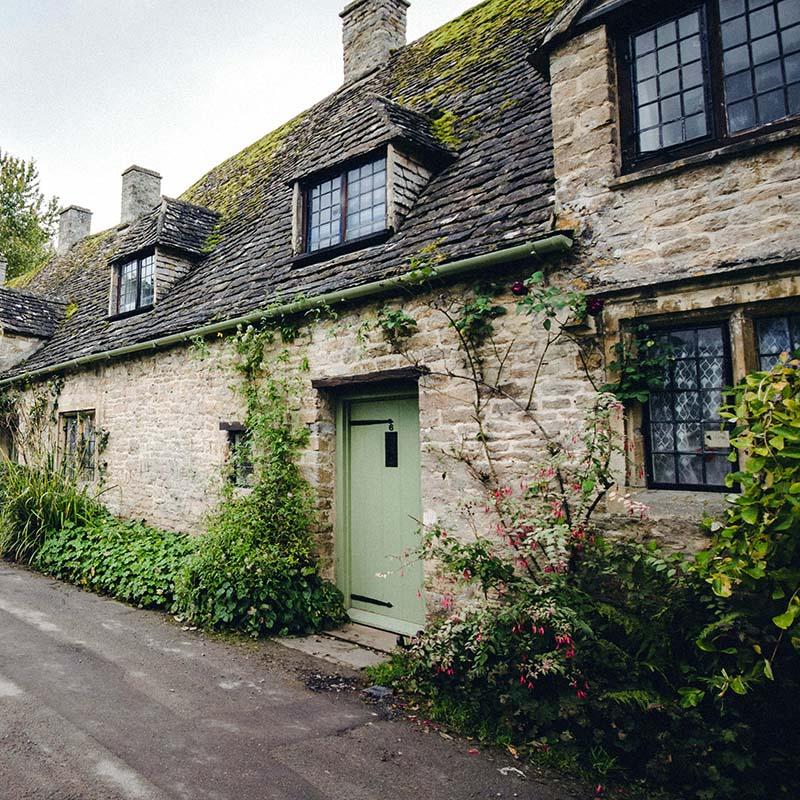 A quaint little cottage with a green door