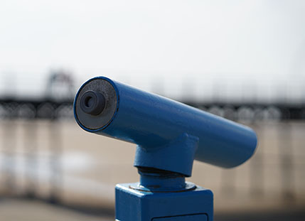 A pier head telescope painted aqua blue in Southport